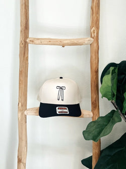 BOW TRUCKER HAT - CREAM/BLACK