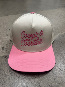 COWGIRLS AND COCKTAILS TRUCKER HAT - PINK/TAN