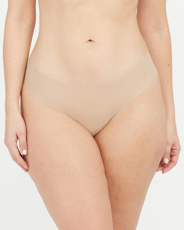 SPANX UNDER STATEMENTS® THONG - NAKED